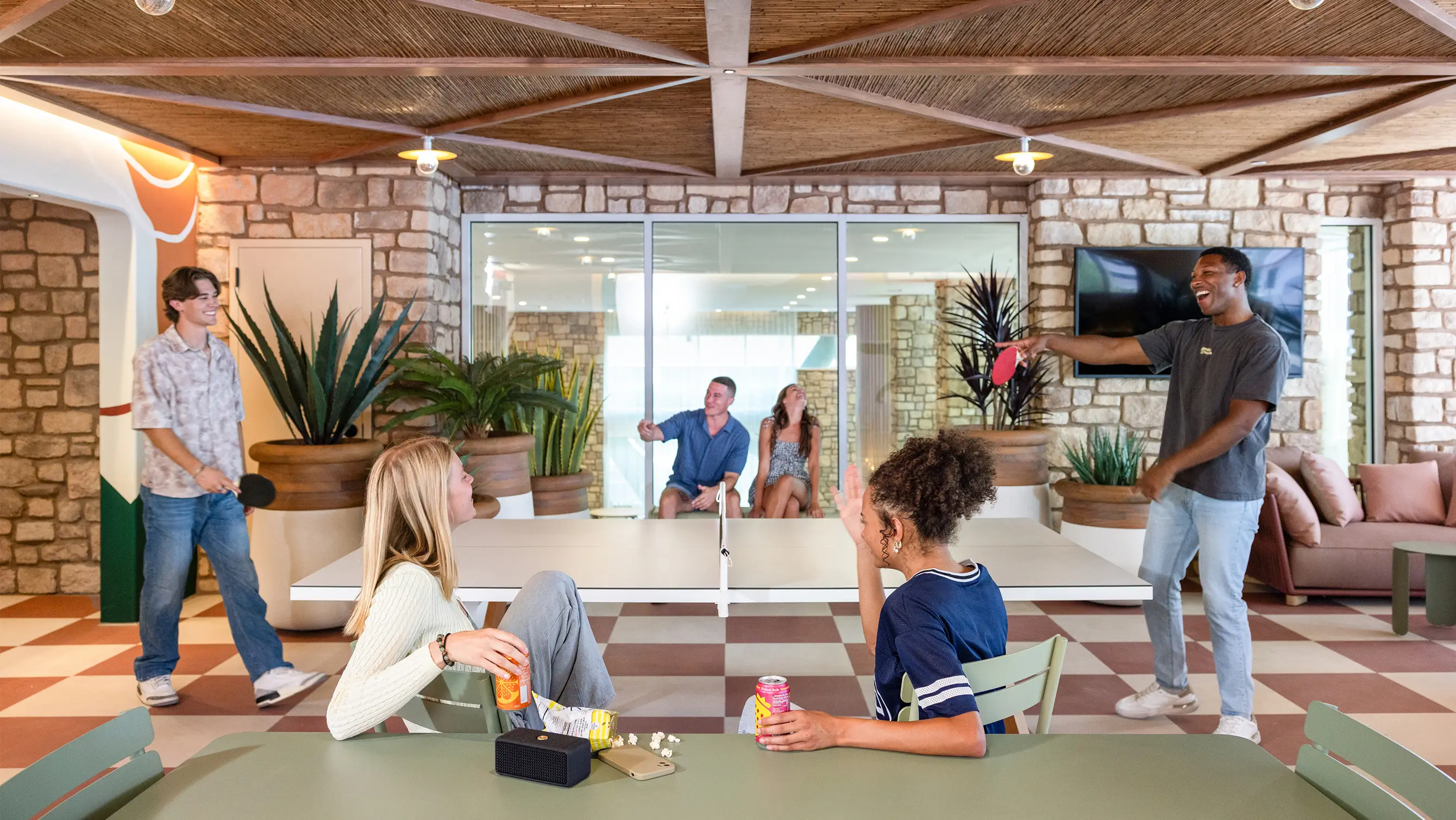 Young adults enjoying the resident lounge