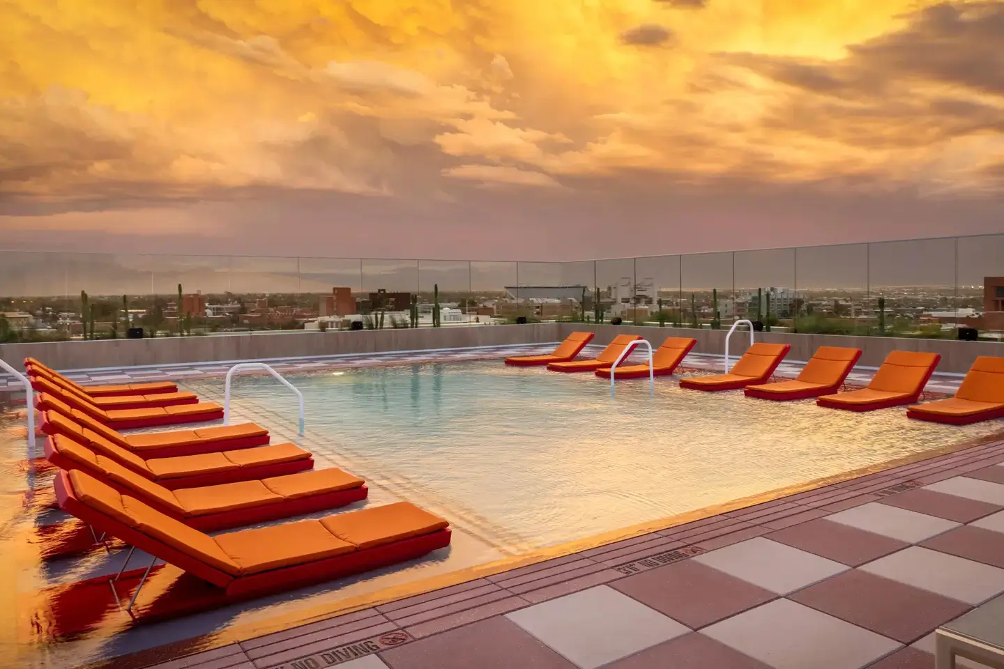 Rooftop pool with seating